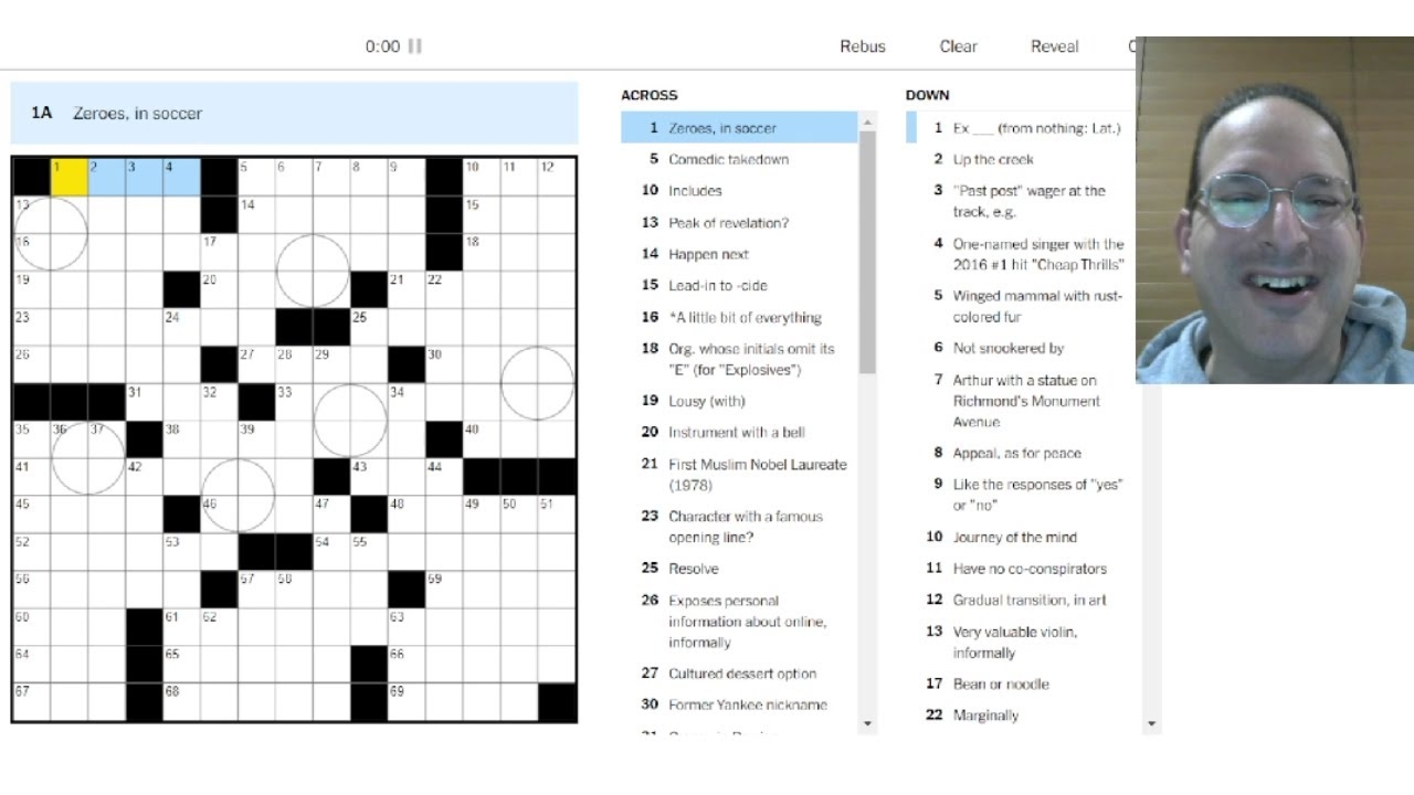crucifix crossword clue